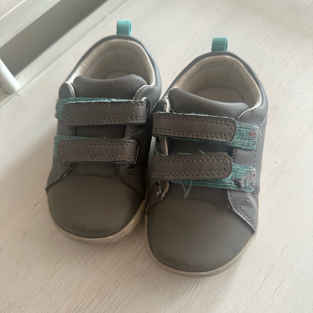 Ten little gray shoes, size 8.5